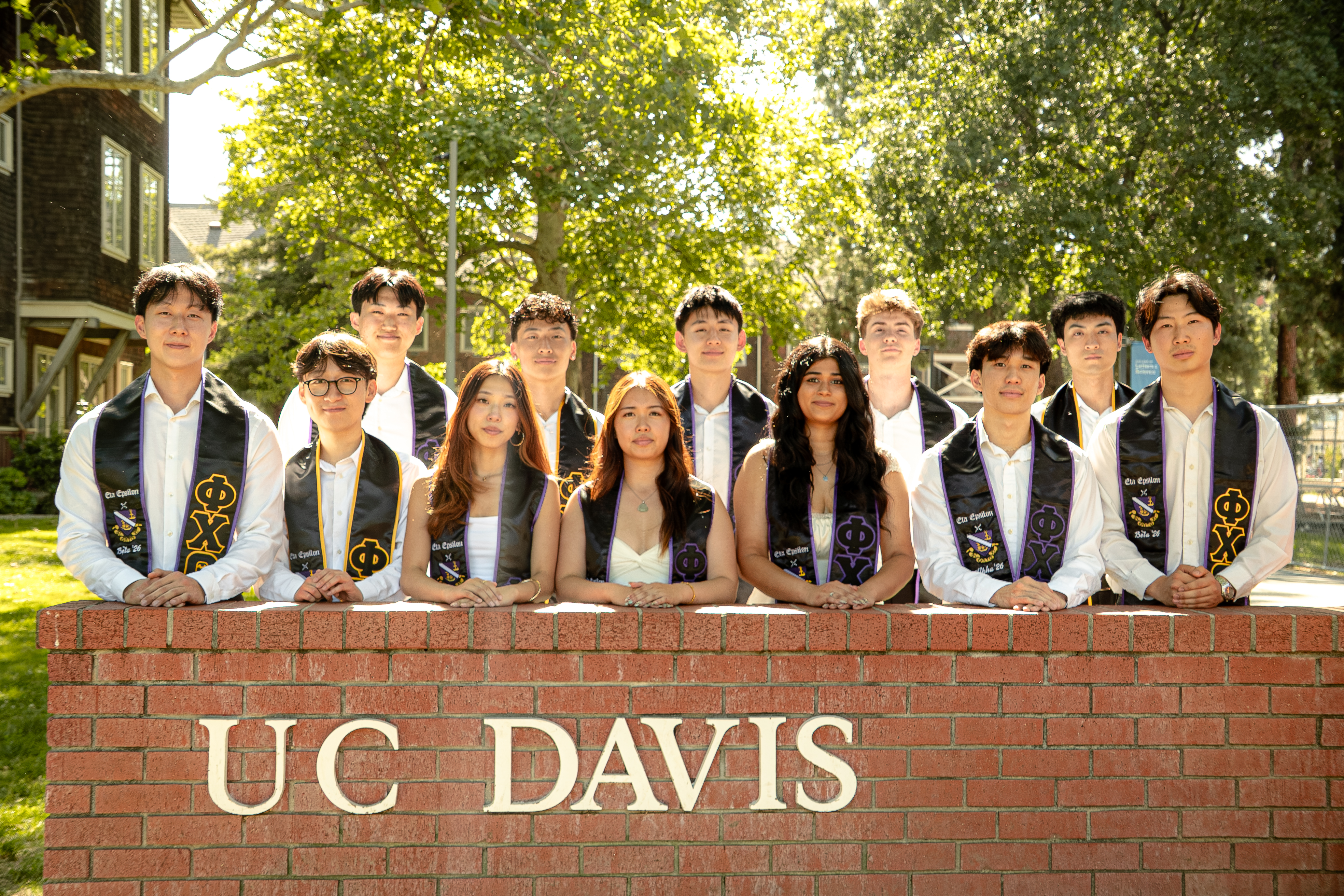 The Phi Chi Theta Eta Epsilon chapter together